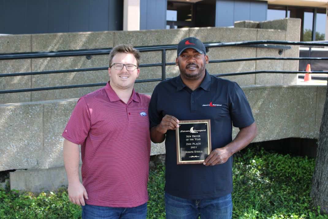 image of Bradford Alexander, Director of Intermodal Operations, and Joseph Steele with award