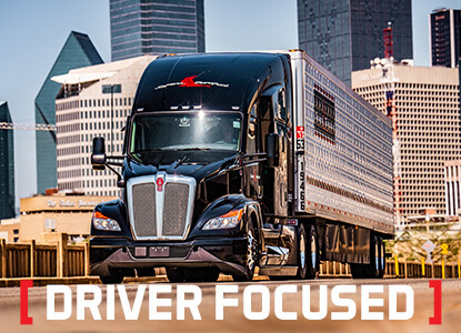 Image of semi truck with the words "Driver Focused" at the bottom