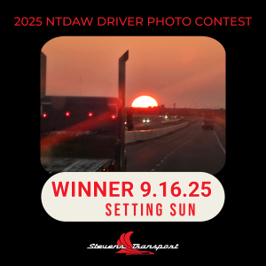 Image of Driver Photo Contest winner; image of a highway with a sunset and semi trucks